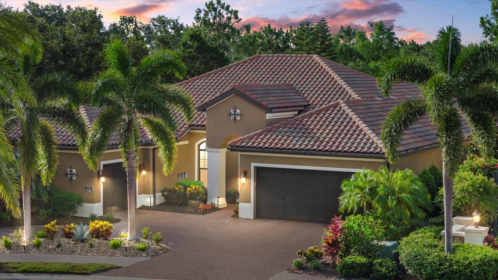 Experience the Ultimate in Luxury Living in Lakewood Ranch Country Club East!
Welcome to a spectacular home that blends luxury, comfort, and style in the heart of Lakewood Ranch’s amazing Country Club East—a resort-style gated community offering exceptional amenities and an unmatched lifestyle. This custom-designed masterpiece sits at the end of a quiet cul-de-sac with a breathtaking water view, and it’s just minutes from downtown Lakewood Ranch, Sarasota, and Waterside Place!
Featuring 4 spacious bedrooms, a private office, and an expansive open-concept layout, this home is built for both elegant entertaining and relaxed everyday living. The gourmet kitchen shines with solid wood cherry cabinetry, granite countertops, a large center island, stainless steel appliances, and stunning Serena & Lily lighting paired with Kohler vibrant brass fixtures.
The main living area showcases coffered ceilings and disappearing sliding glass doors, seamlessly connecting to an incredible outdoor oasis with a wood-paneled lanai ceiling, outdoor kitchen, gas fire pit, and a heated saltwater pool and spa. All pool equipment has been recently upgraded, including the filter, heater, spa valve, and salt cell—ensuring peace of mind and optimal performance.
This meticulously maintained home has been enhanced with a long list of thoughtful upgrades: hurricane shades at the front and rear, repainted interior throughout, luxury vinyl flooring, crown molding, plantation shutters, and a reverse osmosis system with alkaline filtration.
Enjoy beautifully refreshed front and rear landscaping, upgraded irrigation with spray heads, sealed pavers with new polymeric sand, full-home landscape lighting, and a whole-house natural gas line ready for generator hookup.
Security is top-notch with a Ring system featuring a doorbell and three floodlight cameras, plus power hurricane shades for added protection. The oversized 3-car split garage offers custom built-in storage and SafeRack overhead shelving for maximum organization.
The owner’s suite is a retreat of its own with dual walk-in closets, soaking tub, walk-in glass block shower, and dual vanities.
Country Club East residents enjoy three resort-style pools, a fitness center, and access to the Lakewood Ranch Golf & Country Club, with one of its clubhouses located right inside the gates. From world-class golf to nearby dining, shopping, and events—this is the ultimate Florida lifestyle.
Discover the home that delivers luxury, location, and lifestyle—all in one. This is more than a house; it’s your new Lakewood Ranch dream home. Schedule your private showing today!