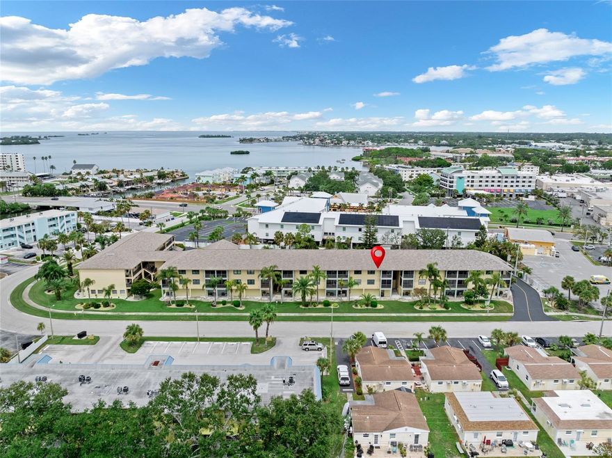 Prime Dunedin Causeway Location – 3rd floor unit with Under-Building Parking and Storage! This 2-bedroom, 2-bathroom condo combines coastal charm, convenience, and an unbeatable address. Situated at the start of the Dunedin Causeway, you’re just minutes from Honeymoon Island’s award-winning beaches, Caladesi State Park, waterfront marinas, scenic trails, and Downtown Dunedin’s vibrant shops, breweries, and restaurants. Inside, the two bedroom floor plan ensures privacy, while cathedral ceilings, wide 2” faux wood blinds, and an enclosed laundry room in the outdoor balcony provide comfort and peace of mind. A screened lanai enclosed creates a perfect retreat, and a full-sized washer and dryer add everyday convenience. The condo also includes two coveted under-building parking spaces, and a private 8’ x 7’ storage room for bikes, beach gear, and more. The community offers a heated pool, community room, picnic areas, and kayak storage, giving residents everything needed to enjoy the Florida lifestyle. From your doorstep, you can walk or bike to the Causeway beaches, restaurants, and shops, or take the Jolley Trolley into Downtown Dunedin for lively festivals, art galleries, and live music. Golf enthusiasts will love the nearby Donald Ross–designed Dunedin Golf Club, recently restored and steeped in history as the former PGA headquarters. Sports fans can catch spring training at TD Ballpark, home of the Toronto Blue Jays, or Clearwater’s BayCare Ballpark with the Philadelphia Phillies. Outdoor lovers have endless options with Honeymoon Island, Caladesi Island, the 45-mile Pinellas Trail, and multiple marinas just minutes away. Everyday essentials like Publix, Walgreens, and local shops are close by, while larger retail centers including Countryside Mall, Westfield Citrus Park, and Clearwater Mall are within a short drive. Mease Dunedin Hospital, Morton Plant Hospital, and Countryside Hospital provide excellent nearby healthcare, and both Tampa International Airport and St. Pete–Clearwater International Airport are under 30 minutes away. Few locations in Pinellas County offer such a perfect balance of convenience, recreation, and natural beauty. Whether you’re boating, biking, golfing, shopping, or relaxing on the beach, it’s all just minutes from your front door. Don’t miss this opportunity to own a move-in-ready condo in one of the Gulf Coast’s most desirable communities. Schedule your showing today and start living the Dunedin lifestyle you’ve been dreaming of.