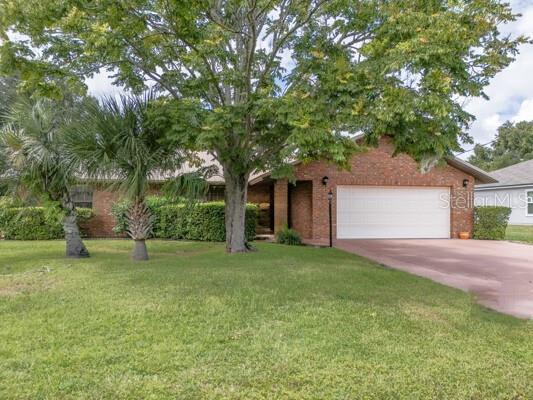 Welcome home to this move-in-ready brick 3 bedroom, 2 bath charmer in a highly established neighborhood just minutes from shopping, top-rated schools, medical services, the beach, and Interstate I-95. Step inside to find a bright, freshly painted interior with refinished hardwood flooring in the main living areas and a classic wood-burning fireplace as the focal point. The kitchen with breakfast bar opens to the dining and living spaces—ideal for everyday living and easy entertaining. All bedrooms feature brand-new carpet for comfort. Relax year-round on the screened-in back porch overlooking a nice backyard, perfect for pets, gardening, or play. A 2-car garage provides secure parking and storage. Outside, the brick walkway adds timeless curb appeal, while the metal roof (2007) and termite bond deliver long-term confidence and value.
Schedule your private tour today—homes in this location and condition go fast!