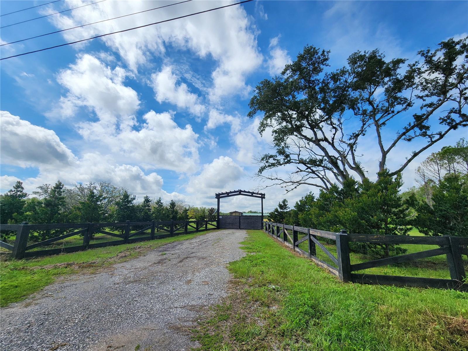 A Rare Opportunity to Own your very own Piece of Paradise in Lake Wales FL. Located Right off of Highway 60 E in Lake Wales, FL (Polk County will assign Lake Wales address if/when a home is built on site). This stunning property is ready for you to make your own with nearly 6 acres of Land 3 Total Parcels included in this sale, 30-31-12-000000-031100 2.31 Acres (612.88x163.61), 30-31-12-000000-031150 2.31 acres (612.88x163.61) and 30-31-12-000000-031110 1.25 Acres (330x163.61). A nature lovers dream! The current owner has installed a MASSIVE 160x45 Pole Barn Built into Poured Concrete Slab, perfect for storing all of your "Toys" (ATVs , Swamp Buggies, UTVs, etc), Property backs up to the South Side of River Ranch Property Owners Association, a Members only Hunt club and sprawling outdoor Oasis (Talk to Main Gate on County Road 630 about getting your access deed and any additional applicable fees as a HWY 60 owner). Front 2 Parcels of the Property have been completely fenced in and gated for added convenience. Well with 5 horsepower pump and Septic with Drain field have already been installed! Concrete Slab already poured with Shipping Container for plentiful on site storage!