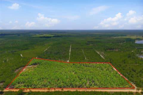 Photo of 70 Maggie Jones Rd, Eustis, FL 32736 (MLS # O6424916)