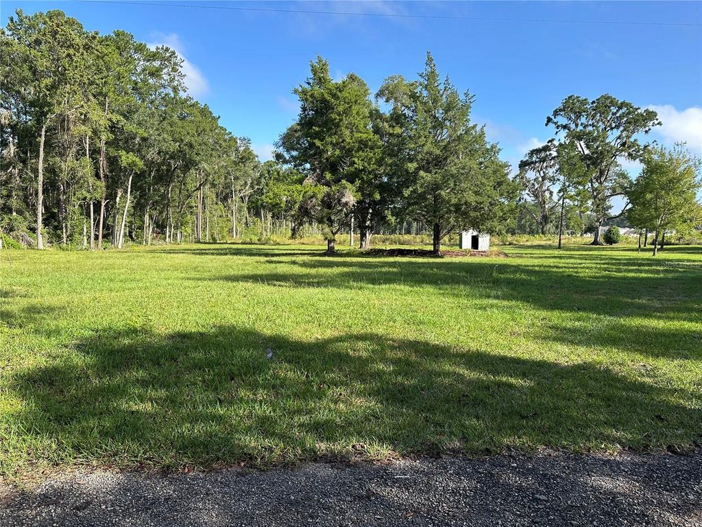 Photo of 5542 SW 57th Avenue, Gainesville, FL 32608 (MLS # OM710844)