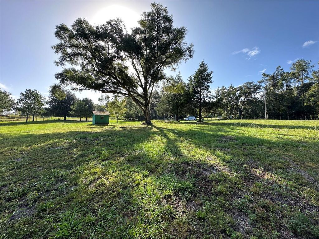 Photo of 5542 SW 57th Avenue, Gainesville, FL 32608 (MLS # OM710844)