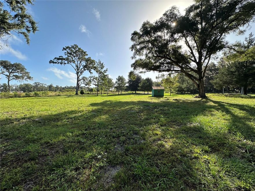 Beautiful 2.3-acre lot located just 8 minutes from Celebration Pointe, I-75, Shands, and the University of Florida. The property has been mostly cleared, with a mix of cedar and oak trees thoughtfully left in place to enhance the natural setting. Much of the hard work has already been done—now it’s ready for you to build your dream home surrounded by nature while still enjoying quick access to all that Gainesville has to offer. As a bonus, a zero-turn riding mower and trailer are included with the purchase.
