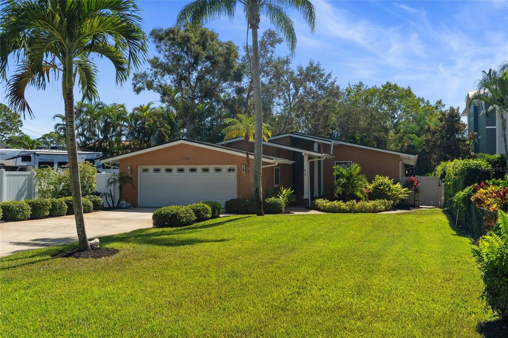 Photo of 13000 Hibiscus Avenue, Seminole, FL 33776 (MLS # TB8439430)