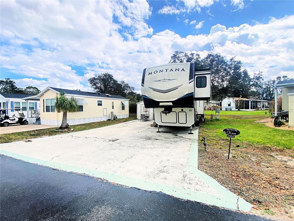 Photo of 7350 Midway Lane #54, Lake Wales, FL 33898 (MLS # P4937973)