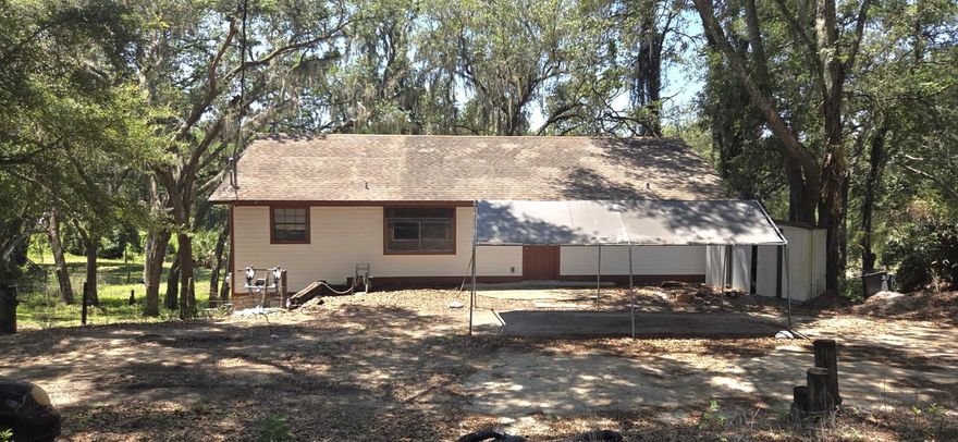 This charming 3-bedroom, 2-bath home is ideally located in a neighborhood with NO HOA/NO CDD. Great property with GREAT potential to become an INCOME Property like an apartment or a mother-in-law.   Minutes from The Villages Spanish Springs Town Square, world-class entertainment, healthcare, and amenities, along with a wide variety of retail and dining options. The home’s spacious split floor plan ensures privacy and flow, perfect for families and guests alike. The HUGE backyard makes it an ideal space for pets, play, or peaceful relaxation, or develop for different amenities if you like. This home offers the lifestyle you've been searching for! Call today to schedule a tour.