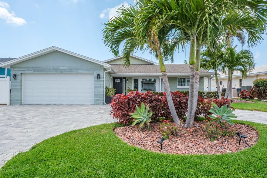 AVAILABLE JUNE 1st FOR ANNUAL LEASE! Live the Treasure Island lifestyle you’ve been dreaming of! Enjoy sunset views, unobstructed boating access to the Gulf of Mexico and short strolls to the sugar-white sands of Treasure Island. Nestled in the waterfront neighborhood of Isle of palms, this beautifully renovated waterfront home offers water views from the moment you walk in the door. Designed for both comfort and entertainment, this home has been completely updated from top to bottom and features over 1,800 sqft of open living space with 3 bedrooms, 2 bathrooms, dining area and living room with pool views. Fresh coastal finishes enhance the light and airy feel throughout. The custom designed kitchen is both stylish and functional, showcasing all wood cabinetry, quartz countertops, stainless steel appliances and a large center island—perfect for entertaining or casual dining. A new wet bar has been added as well with an ice maker and wine fridge! The large primary suite is a true retreat, offering serene Intracoastal views, a walk-in closet, sitting area with desk space, and a spa-inspired bathroom with dual vanities and a glass walled walk-in shower. So many updates have been made to this home including All impact rated windows/doors/sliders, new AC and Water Heater, electrical and plumbing, recessed lighting, new paint, tile flooring throughout, roof, paver driveway and landscaping! Step out back to a large 700 sqft  covered patio space overlooking the pool and waterfront backdrop. Boaters will love the deep, protected water with quick access to Boca Ciega Bay, the Gulf of Mexico, and popular waterfront dining destinations. The Trek deck dock has full power and water along with a 13,000lb boat lift and wet slip. After a day on the water, unwind in your heated saltwater pool and spa or fire up the grill for an evening by the water. This home is the ultimate blend of indoor-outdoor living, offering tranquil sunrise views in a quiet neighborhood just minutes from the beach, tennis courts, playgrounds, top-rated restaurants, shopping, and entertainment. Plus, you’re only 20 minutes from the vibrant Downtown St. Petersburg and 40 minutes to Tampa International Airport for a quick flight in. Here, beach life takes over—and everyday worries fade away. Don’t miss your chance to call this amazing beach home yours! First Month, Last Month, Security Deposit and Cleaning fee required.