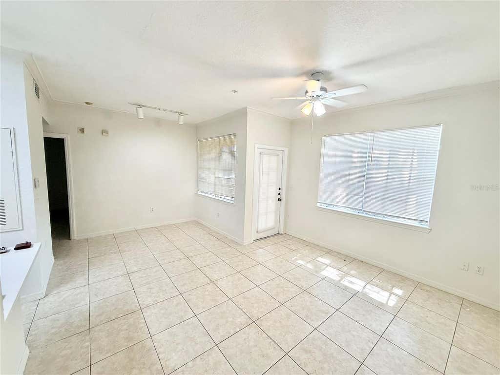 Photo of 2674 Robert Trent Jones Drive #312, Orlando, FL 32835 (MLS # O6430951)
