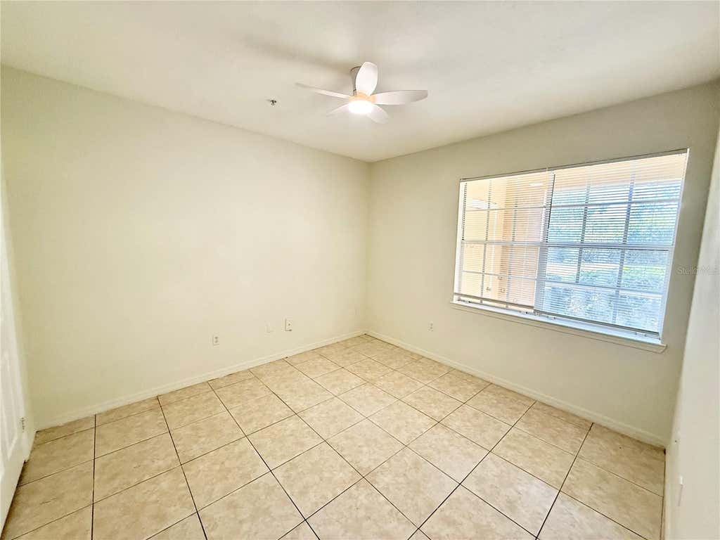 Photo of 2674 Robert Trent Jones Drive #312, Orlando, FL 32835 (MLS # O6430951)