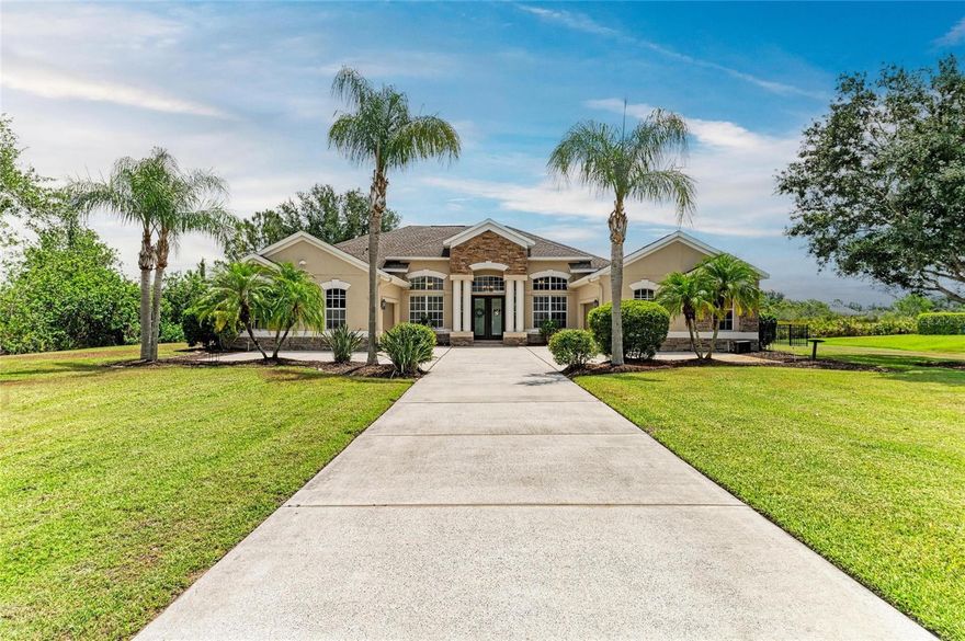 This stunning home in Preserve at Panther Ridge offers 4 bedrooms, 3.5 bathrooms, a dedicated office, bonus room upstairs, and a 4-car garage. Enter through double glass doors into a spacious interior with soaring ceilings.

The dining room has elegant columns and tray ceilings, and a living room with picturesque views of the pool, backyard, and pond.
The remodeled kitchen features quartz countertops, soft-close cabinets and drawers, extra storage, under-cabinet lighting, a vent hood, and top-of-the-line Bosch appliances—ideal for a chef’s dream.
The spacious primary suite overlooks the backyard and boasts tray ceilings. The en-suite bathroom has been upgraded with quartz counters, high-end cabinetry, new tile, a jet bathtub, and a walk-in shower. The split floor plan offers privacy to the primary bedroom.
Additional 2 bedrooms share Jack & Jill bath with high-end finishes and quartz counters, along with a fourth bedroom and bathroom, perfect for guests—featuring a stunning glass sink. 
This home also features convenient half-bath that serves guests and pool visitors.
A private office with large windows provides a perfect workspace. 

The gem of this home is the bonus room upstairs; this room features engineered hardwood designed floors and great views. If you are a pool player, the beautiful table can stay. This room also has a sitting area. 
The backyard feels like a resort, with a large pool, full outdoor kitchen, and expansive covered areas, all overlooking a fenced yard and pond. The home sits on a pristine lot with a preserve on one side for added privacy and a picturesque pond in the back.
Recent upgrades include a new roof with a GAF 25-year warranty (2019), a 2019 tankless water heater, LG washer and dryer (2019), pool heater (2020), pool cage screen (2021), exterior house paint (2023), and a new pool pump (2023).
Living in Preserve at Panther Ridge offers an active community lifestyle with scenic trails, parks, playgrounds, tennis, and basketball courts. Conveniently located near Waterside, Lakewood Ranch Main Street, and UTC Mall, with easy access to shopping, dining, and entertainment.