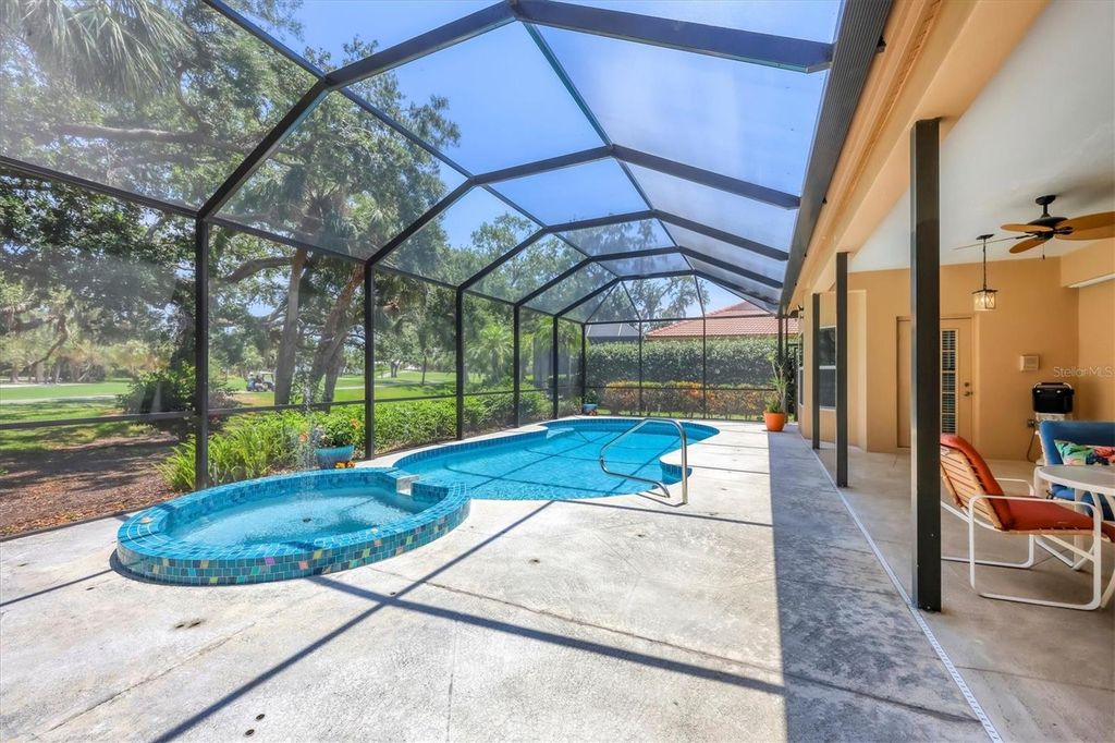 Photo of 7551 Calle Facil, Sarasota, FL 34238 (MLS # A4666773)