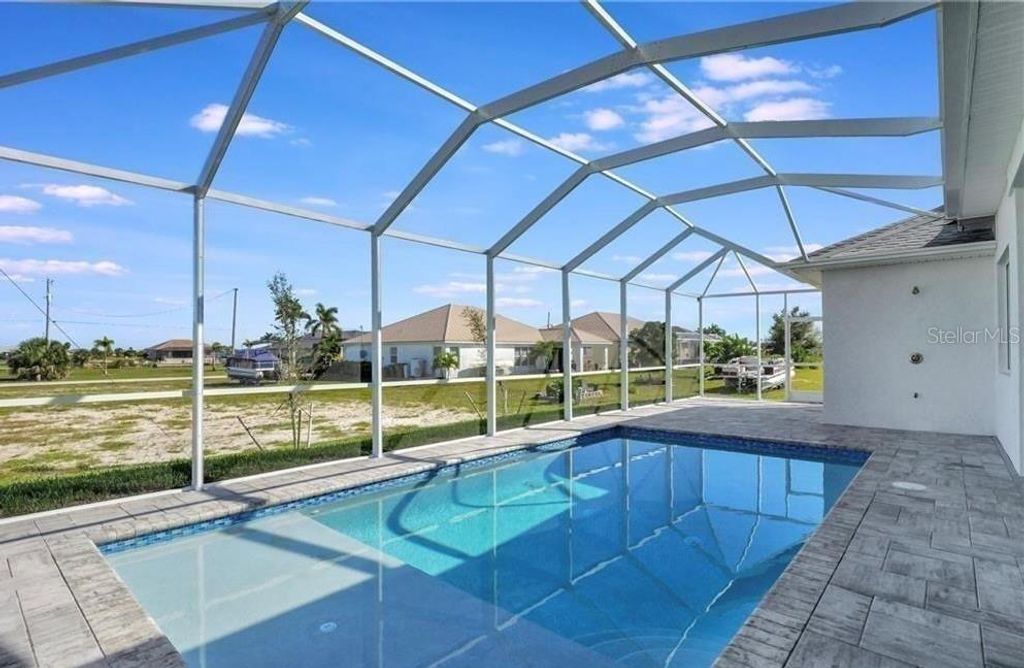 Photo of 4421 NW 32nd Lane, Cape Coral, FL 33993 (MLS # C7525181)