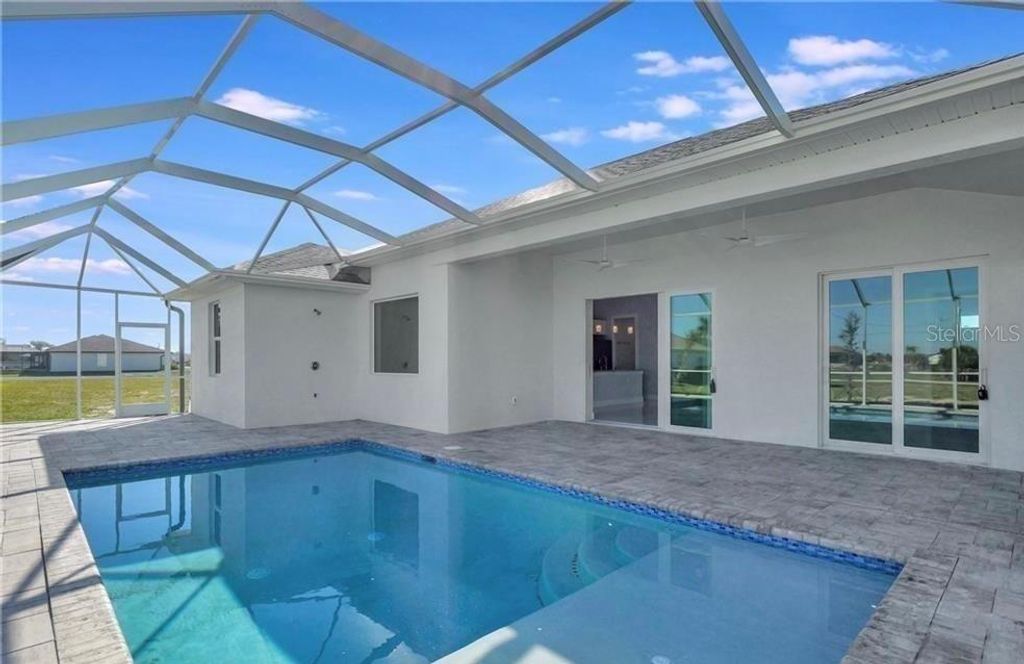 Photo of 4421 NW 32nd Lane, Cape Coral, FL 33993 (MLS # C7525181)