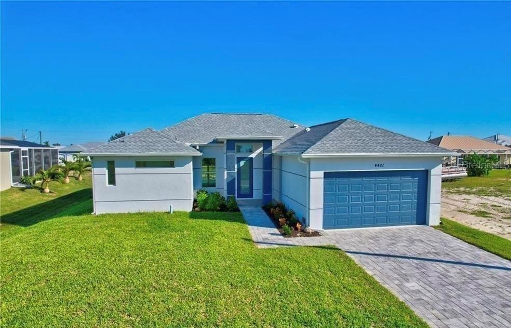 Photo of 4421 NW 32nd Lane, Cape Coral, FL 33993 (MLS # C7525181)