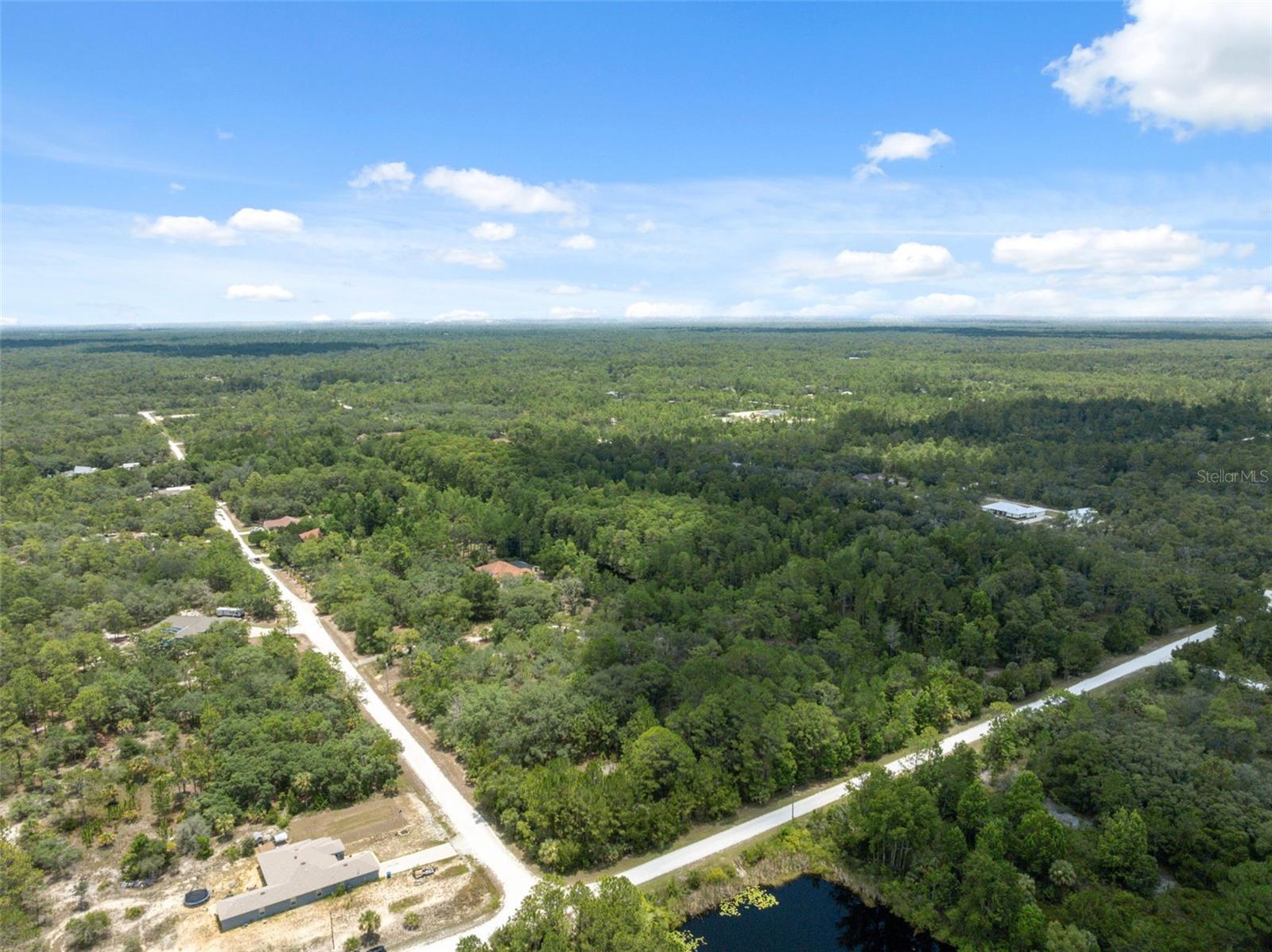 Corner Lot Opportunity in Royal Highlands – 1.25 Acres!
This spacious 1.25-acre corner lot in Royal Highlands offers endless potential for your custom-built home. Zoned R1C with no HOA or deed restrictions, this property gives you the flexibility to design your lifestyle your way. Positioned on a corner for enhanced access and visibility, it's ideal for a larger home footprint, side-entry garage, or even a circular drive. Surrounded by natural Florida beauty and just minutes from amenities, this lot is a fantastic opportunity for homeowners and investors alike. Conveniently located near shopping, schools, and major roadways. Whether you're ready to build now or invest for the future, this property offers endless potential. Explore nearby attractions, including the Gulf of Mexico and the famous Weeki Wachee Springs, perfect for outdoor enthusiasts and adventure seekers alike.
Buy this lot individually or combine it with the adjacent 1.3-acre parcel for over 2.5 acres of space and privacy!