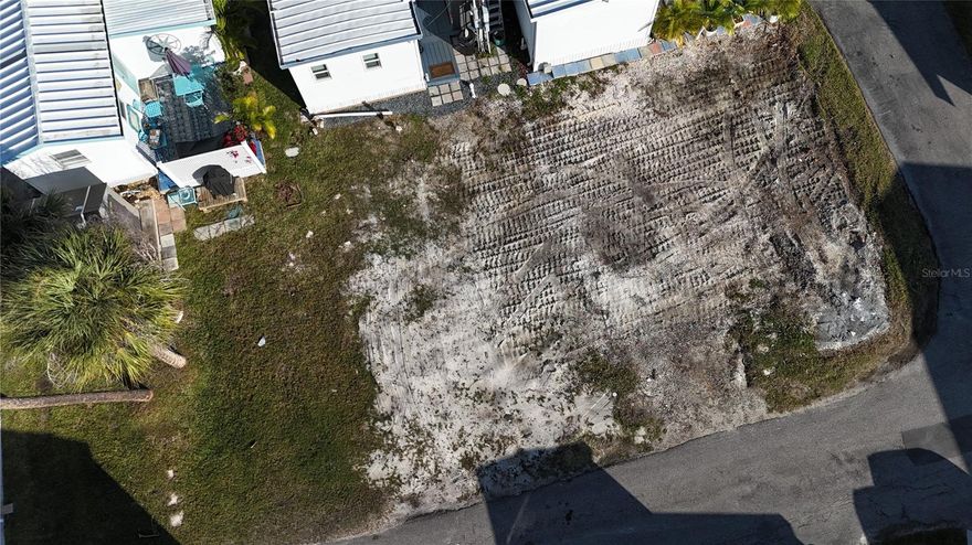 This rare vacant lot opportunity at the Sandpiper Resort Co-op on Anna Maria Island offers the perfect canvas to build a brand-new coastal retreat in one of the island’s most desirable communities. The lot allows for the placement of a new unit, giving you the unique ability to create a custom residence designed for modern island living, and floor plan drawings for a new unit are already available to help streamline the process and bring your vision to life. As an owner at Sandpiper Resort Co-op, you’ll enjoy a true resort-style lifestyle with access to a heated swimming pool, expansive sun deck, clubhouse and social gathering areas, shuffleboard courts, barbecue and picnic spaces, on-site laundry facilities, and beautifully maintained tropical landscaping, all just steps from Anna Maria Island’s sugar-sand beaches, stunning sunsets, and the laid-back coastal charm that makes this location so sought after.