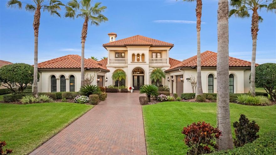 Welcome to 1207 Merry Water Drive, an exceptional Arthur Rutenberg–built estate located in the highly coveted Ladera neighborhood. One of only four Arthur Rutenberg homes in the community—and the only 5-car garage home in Ladera—this residence was proudly featured on the cover of Legendary Homes. Set on a premier large lake lot with low HOA fees and zoned for Steinbrenner High School, this property offers a rare blend of luxury, technology, and thoughtful design.
From the moment you arrive, you’ll be impressed by over 2,000 square feet of newly sealed entry pavers (2025), extensive mature landscaping with irrigation and drip systems, dramatic landscape lighting, and nine mature Washingtonian palm trees creating stunning curb appeal—especially at night. Hurricane-impact windows throughout provide peace of mind with no shutters required.
Inside, the home is fully integrated with a Control4 smart home system, allowing lighting, audio, security cameras, TVs, climate control, and more to be managed seamlessly from your phone. The gourmet kitchen features custom cabinetry, South African granite, GE Profile gas appliances (all under three years old), reverse-osmosis water, wine bar with refrigerator, and built-in security monitoring. Adjacent living and family spaces showcase custom ceiling details, wood beams, marble gas fireplace, expansive sliding doors, surround sound, and designer drapery—perfect for both entertaining and everyday living.
The spacious primary suite offers private pool access, walk-in closets with custom built-ins, Control4 surround sound, and a spa-like bath with oversized dual-head shower. Additional bedrooms include private baths and balconies, while the upstairs family room opens to an outdoor balcony with surround sound and lake views.
Outdoor living is exceptional with a full screened pool enclosure, travertine pavers, illuminated pool and spa with dual motors and fountain feature, and a custom gazebo complete with a 2025 built-in grill, cooktop, refrigerator, and TV. Whether hosting gatherings or relaxing lakeside, this space is designed to impress.
Additional highlights include three separate AC units (primary unit just six months old), Vivint security system, hurricane protection, dedicated study, smart laundry room with Control4 rack system, and two garages totaling five parking spaces—one with EV-ready high-amp outlet, custom cabinetry, work area, and advanced lighting and irrigation controls.
This is a truly rare opportunity to own a technologically advanced, meticulously maintained luxury home in one of the area’s most desirable communities. Schedule your private showing today.