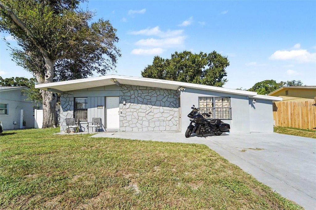 Photo of 4834 Alvarado Drive, Tampa, FL 33634 (MLS # TB8549540)