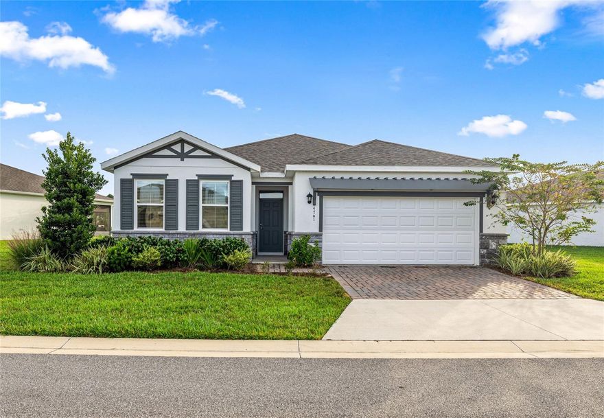 NEARLY NEW 4BR, 2BA Delray Model on EXTRA-WIDE LOT in Ocala Preserve
This upgraded home (built July '23) offers the perfect blend of comfort and luxury on a hard-to-find premium jumbo lot with a fully fenced back yard. Designed to suit both cozy living and entertaining, it’s ideal for couples, families, or those needing extra space for an office or hobbies. Featuring 9'4" ceilings, fresh paint, elegant dark stone countertops, quality appliances, tilt-lock windows, wired as a SMART HOME to capitalize on energy savings and fiber optic internet, this home is as efficient as it is beautiful. The spacious primary en-suite bedroom is a true retreat with 2 walk-in closets, a luxurious granite, full bathroom-length double vanity, and a water closet for added privacy. This model has plenty of natural light from north and east, and the inside HVAC closet also keeps electric bills low. Enjoy the hassle-free resort-style lifestyle: HOA includes high-speed internet, yard and landscape maintenance along with recreation areas. The clubhouse hosts a day spa, chic dining options, fitness center, pro/sports shop, and waterfront pavilion to enjoy the glorious Florida sunsets. Outdoor enthusiasts will love the 18-hole Master professional golfer-designed golf course for all levels of play, 21-miles of trails with exercise stops, both a resort-style pool & a lap pool, racquet courts, golf cart paths throughout the community and parks for the dogs, too! UPGRADES include SCREEN-ENCLOSED LANAI, decorative stone accents on full-textured stucco, FRESH INTERIOR PAINT, recessed LED LIGHTING, ceiling fans, STAINLESS STEEL appliances, and an attractive onyx aluminum FENCED YARD designed specifically for the smallest breeds but extra height for the big dogs. The family will love the space too! Something for everyone: 10 Minutes to World Equestrian Center and Ocala International Airport. 5 minutes to Publix shopping plaza, HSA & UF Emergency clinics and I-75. There is a transferable Builder Warranty. MUST SELL. WON'T LAST ON MARKET LONG. Seller offering $3,000 towards closing costs, prepaids, or rate buy down at full price.