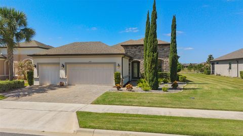 Photo of 1222 Zeek Ridge Street, Clermont, FL 34715 (MLS # O6398370)