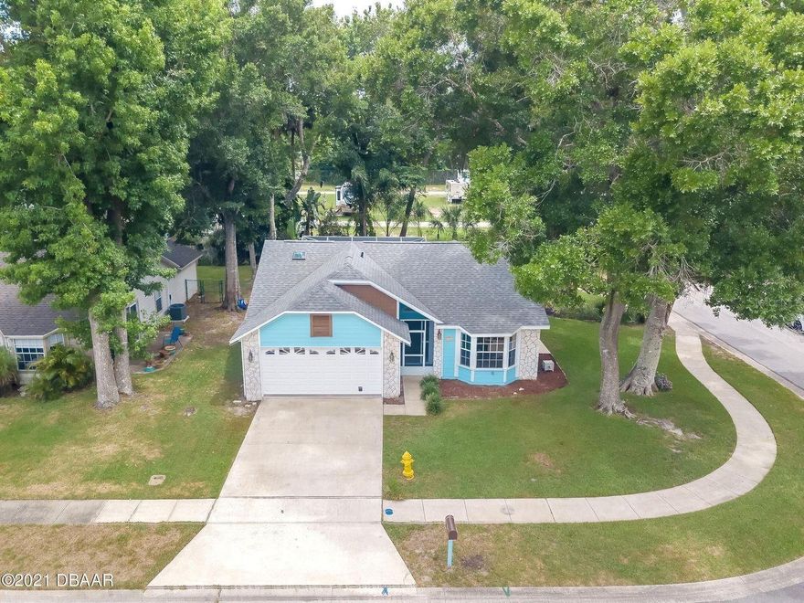 Port Orange POOL home - WOW! Corner lot with a private, quite setting on a dead end street. Inside the home features a brightly lit open concept with a split bedroom plan, built in speakers, built in tropical bar in the Florida room just made for entertaining. Outside the Florida room features the pool and large dinning table and chairs with a charcoal grill. The house is a tropical oasis in the middle of the city ~ very close to all the amenities. All room measurements are intended to be accurate but not guaranteed. ;Water: City