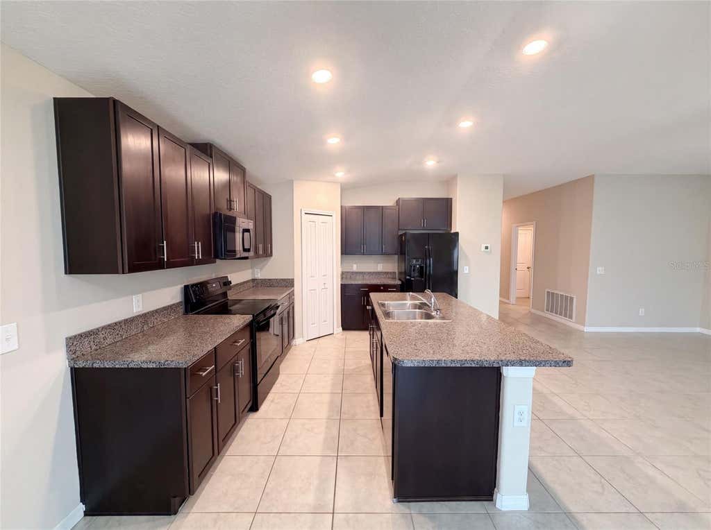 Photo of 39693 Harvest Creek Lane, Zephyrhills, FL 33540 (MLS # O6430369)