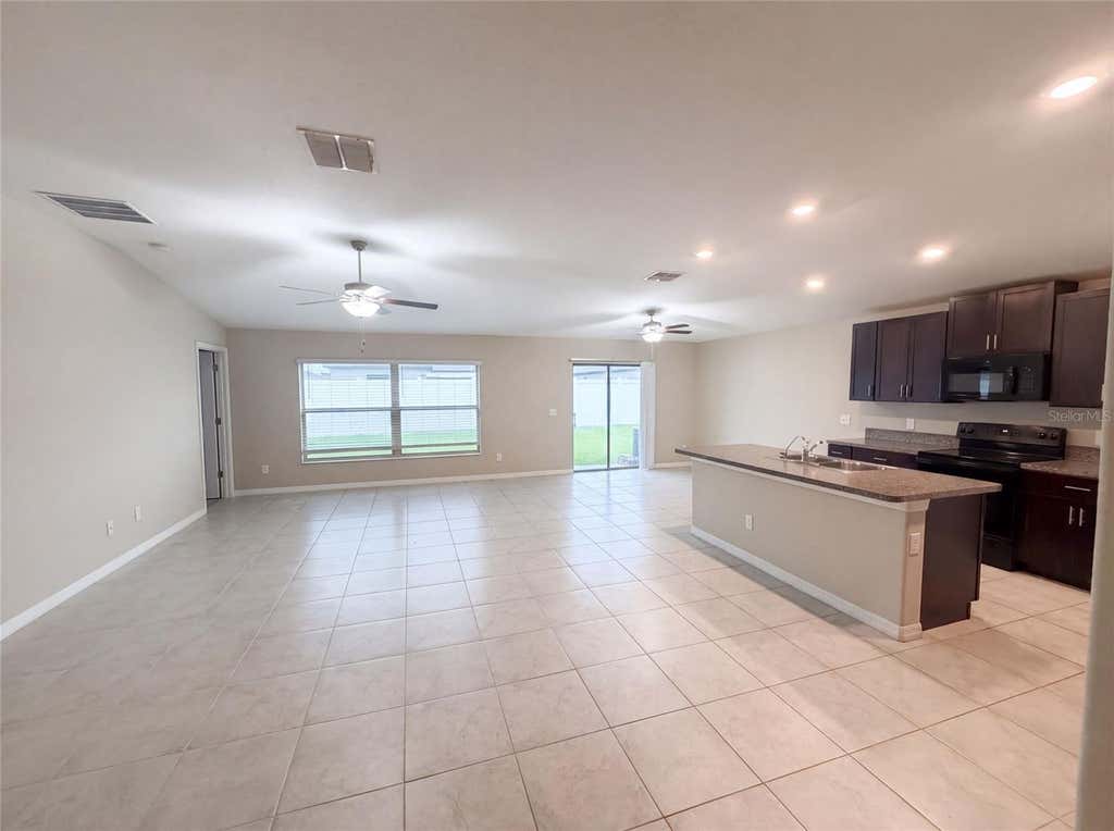 Photo of 39693 Harvest Creek Lane, Zephyrhills, FL 33540 (MLS # O6430369)