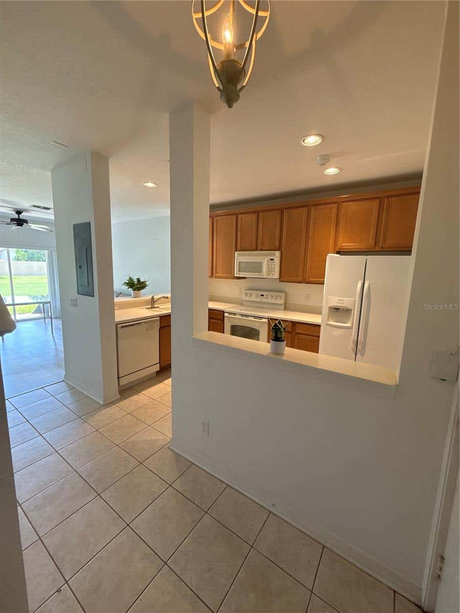 Photo of 10410 Manderley Way #103, Orlando, FL 32829 (MLS # TB8542104)