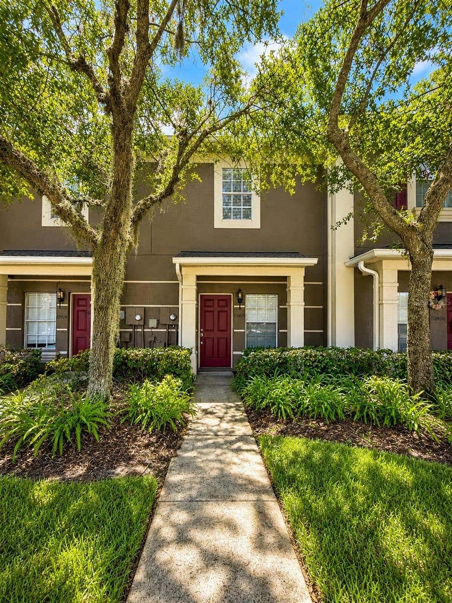Photo of 10410 Manderley Way #103, Orlando, FL 32829 (MLS # TB8542104)
