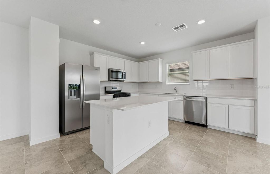Photo of 9127 Newmons Place, Wildwood, FL 34785 (MLS # TB8433814)
