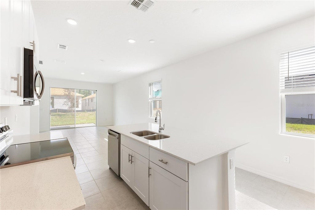 Photo of 2031 Anthem Drive, Orange City, FL 32763 (MLS # O6415002)