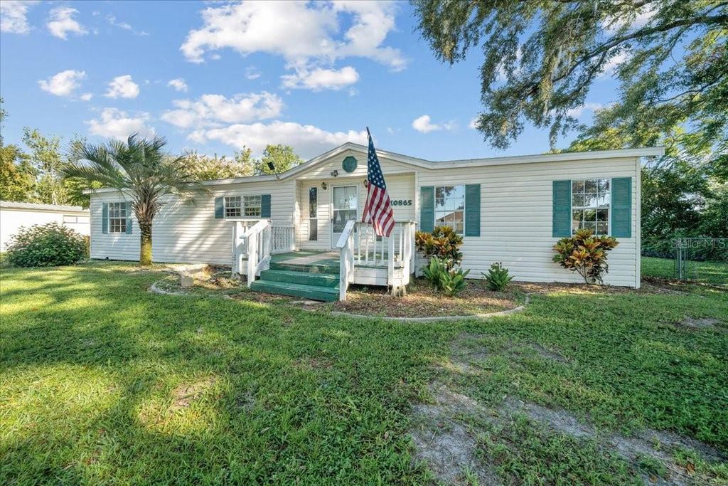 Photo of 10865 SE Timucuan Road, Summerfield, FL 34491 (MLS # OM710035)