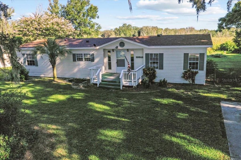 Photo of 10865 SE Timucuan Road, Summerfield, FL 34491 (MLS # OM710035)