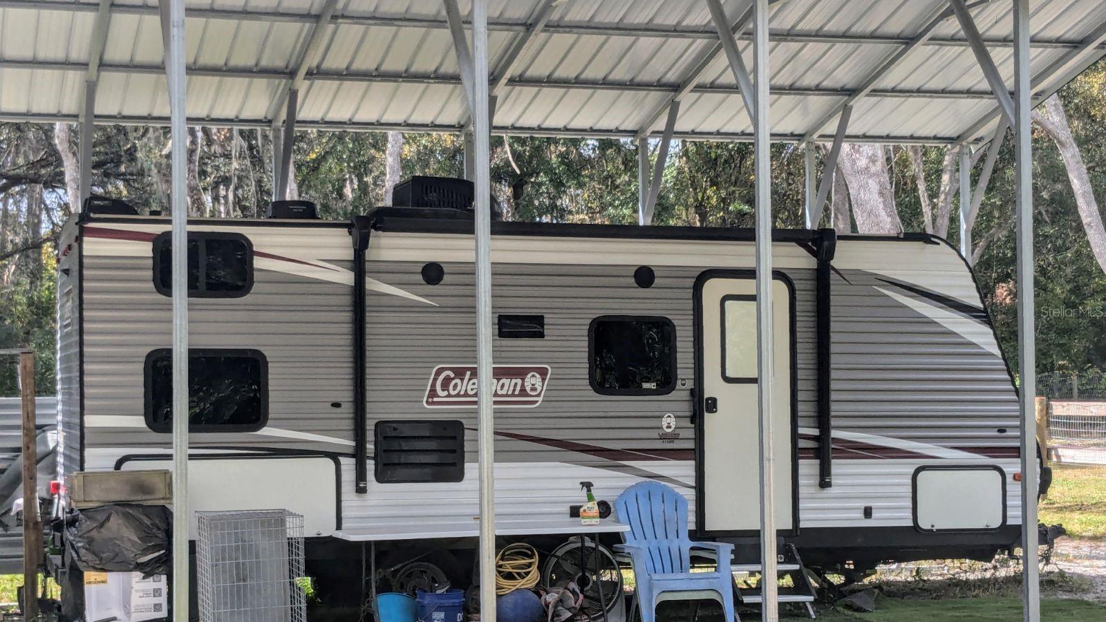 This gorgeous piece of property it is located at the begginning of the Fl Highlands, on 145th St and 85th, It does include a well and water softener, a light pole, which is $12.00 a month, a Recreational Vehicle 2020 Coleman 26ft 215hp, RV carport, John Deere lawn mower, facing the beautiful Ross Prairie State Forest. Call Today for your appointment!