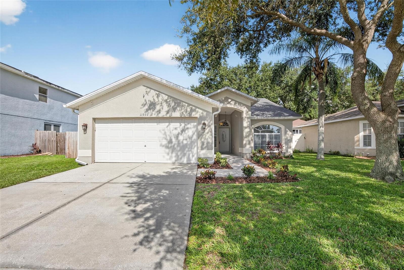 Welcome to your dream home in the heart of Riverview! This beautifully maintained 4-bedroom, 2-bathroom, 2-car garage home is nestled in the sought-after community of Summerfield Village, known for its family-friendly amenities, peaceful surroundings, unbeatable location, NO CDD, and LOW HOA. From the moment you arrive, you’ll be impressed by the home’s charming curb appeal, beautiful landscaping, and inviting entryway. Step inside and discover a freshly painted open-concept floor plan designed for both comfort and functionality. The spacious living and dining areas feature, neutral finishes, and plenty of room for entertaining. The functional kitchen boasts granite countertops, stainless steel and white appliances, and a closet pantry—perfect for casual meals or gathering with family and friends. The primary suite offers a true retreat with a generous layout, walk-in closet, and en-suite bathroom featuring dual sinks, and a shower/tub combo. Additional bedrooms are thoughtfully positioned to provide privacy and flexibility—ideal for guests, a home office, or a growing family. The 4th bedroom is conveniently near the lanai, making outdoor living/working a breeze. Speaking of outdoor living, the screened lanai and partially fenced backyard are perfect for enjoying Florida’s sunshine year-round. Whether you’re sipping your morning coffee, grilling with friends, or simply unwinding after a long day, this space is designed for relaxation and fun. Located in the vibrant Summerfield Village community, residents enjoy resort-style amenities including sparkling pools, playgrounds, basketball courts, walking trails, and more. The neighborhood is zoned for highly rated schools and is just minutes from shopping, dining, entertainment, and major highways—offering an easy commute to downtown Tampa, MacDill AFB, beaches, and beyond. This move-in ready home combines modern living, convenience, and Florida charm all in one package. Don’t miss the opportunity to make 11930 Lark Song Loop your new address—schedule your private showing today!