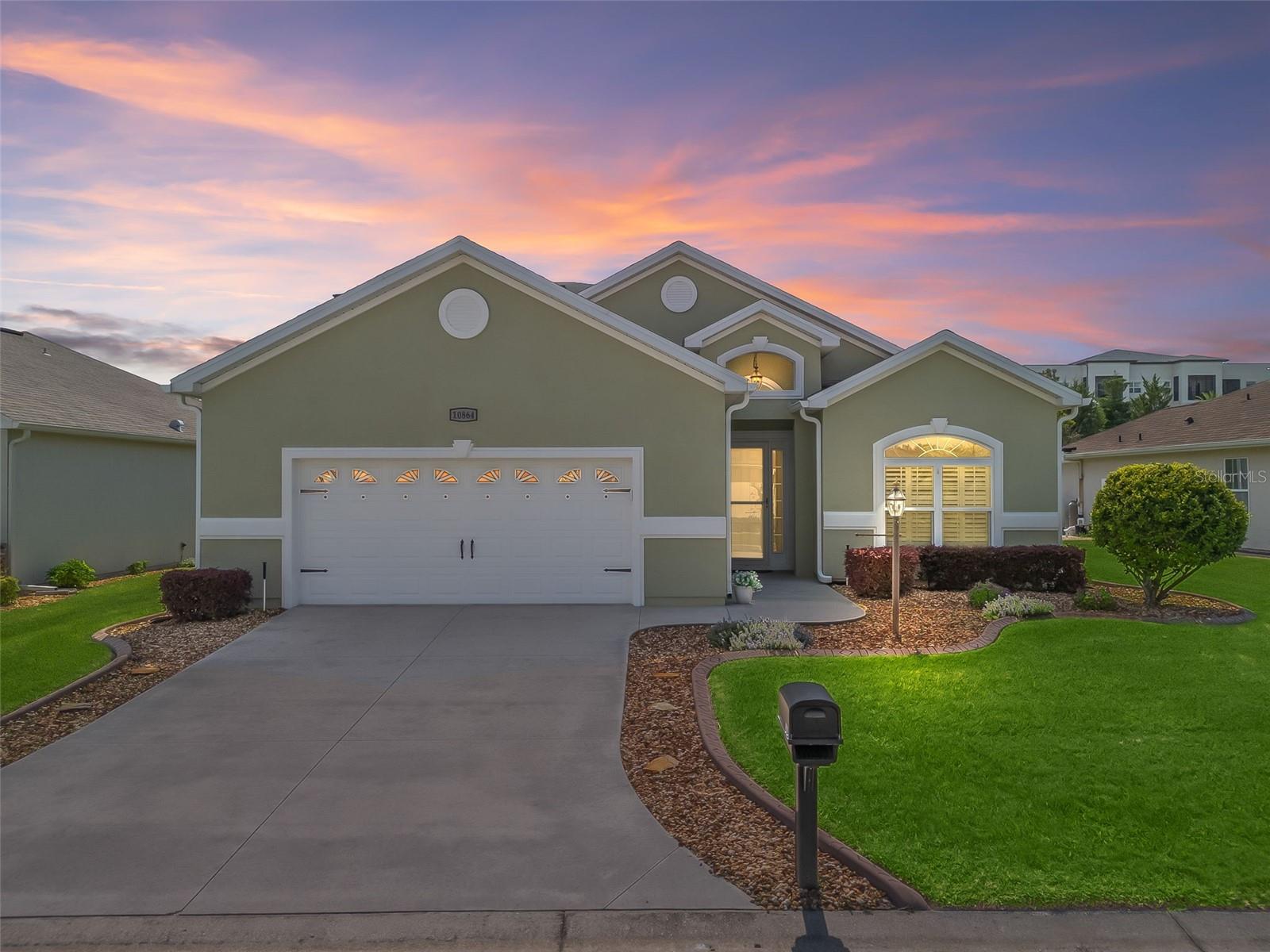 One or more photo(s) has been virtually staged. Priced to sell! Welcome home!!! Stonecrest is a private, 55+gated golf community w/ Envera System access which provides many benefits to the residents and the community overall. This is a golf community for active adults offering over 26 clubs, 67 activities, 4 pools (including an indoor saltwater pool), and a newly remodeled clubhouse with dining, and entertainment. Conveniently located, you can reach shopping, medical, BJ's, THE VILLAGES and more all by golf cart! The HOA fee is just $148 per month, providing you with a new affordable, fun and active lifestyle!
The seller's have provided an upgrade/update list for this home, which is quite extensive, so please ask for that regarding all the recent benefits.
This highly desirable 2017 Hickory model in North Valley II features 3 bedrooms all with closets, tall ceilings, 2 full baths, an oversized garage and other features which makes this a perfect Florida home in a highly desirable area in the commmunity. The open floor plan offers a great open kitchen, granite counters, plantation shutters, tall cabinetry, tile floors, and newer LVP flooring in the bedrooms. The kitchen is designed with stainless steel appliances, soft-close cabinetry with a lazy Susan, tile backsplash, breakfast bar, island, oversized pantry, and a vented microwave. The spacious primary ensuite offers a tray ceiling, while the formal dining room also highlights a tray ceiling for additional architectural detail. This is one of the most desirable floor plans in Stonecrest!
Additional extra features that you should note includes an enclosed Florida room with triple sliding glass doors to the great room, aluminum
pull-down stairs in the garage for more storage, exterior flood lights with light sensitivity detection, stone landscaping with mature plantings, and a metered irrigation system.
This home is move-in ready, beautifully maintained, and priced to sell! Call today for your private tour. Home is occupied. The spa is optional, sold as is condition.