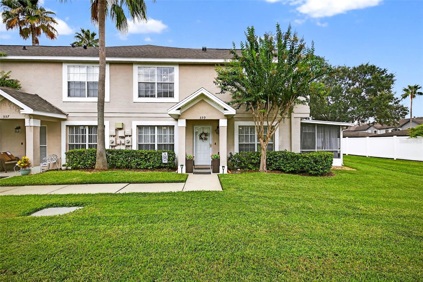 Enjoy instant peace of mind with a new 2025 roof and an updated 2021 water heater in this bright, corner end unit. 1,159 sq ft with two bedrooms and two and a half baths, this move in ready townhome sits inside a quiet, gated community at the very end of a dead end road, so there is no through traffic, only residents and guests. The corner lot adds extra privacy and a wide stretch of green space along the side and rear. Step onto the welcoming covered front porch and into a light filled living room with a large front window and smooth flow to the formal dining room. A pass through serving window connects the dining area to the kitchen, which features granite countertops, a mosaic tile backsplash, two tone cabinetry with modern hardware, stainless steel appliances, pendant lighting, and a deep double sink with a pull down faucet. Sliding glass doors open to a roomy screened lanai with a ceiling fan and wood look flooring, an inviting spot for morning coffee or evening unwinds overlooking the lawn. A convenient half bath completes the first floor. Upstairs, two generously sized bedrooms await. The primary suite includes a walk in closet and an ensuite bath with a tub and shower combo and a stone accent wall. The guest bedroom offers a built in closet and sits just steps from the second full bath. A laundry closet with a full size dual washer dryer in one is also located on the second level. Community perks include a sparkling pool, sidewalks, and plenty of space for walking, jogging, or biking, with quick connections to Brandon Parkway and nearby trails. Despite the tranquil setting, you are close to the Selmon Expressway, I 75, I 4, State Road 60, US 301, and US 41. Parking is easy with one assigned space, plus abundant guest and pool parking nearby. Enjoy the best of both worlds, peace and privacy in a vibrant, central Brandon location. Do not miss this well maintained gem.