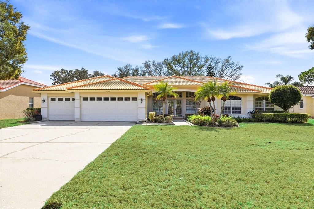 Photo of 3196 Crescent Oaks Boulevard, Tarpon Springs, FL 34688 (MLS # TB8477613)