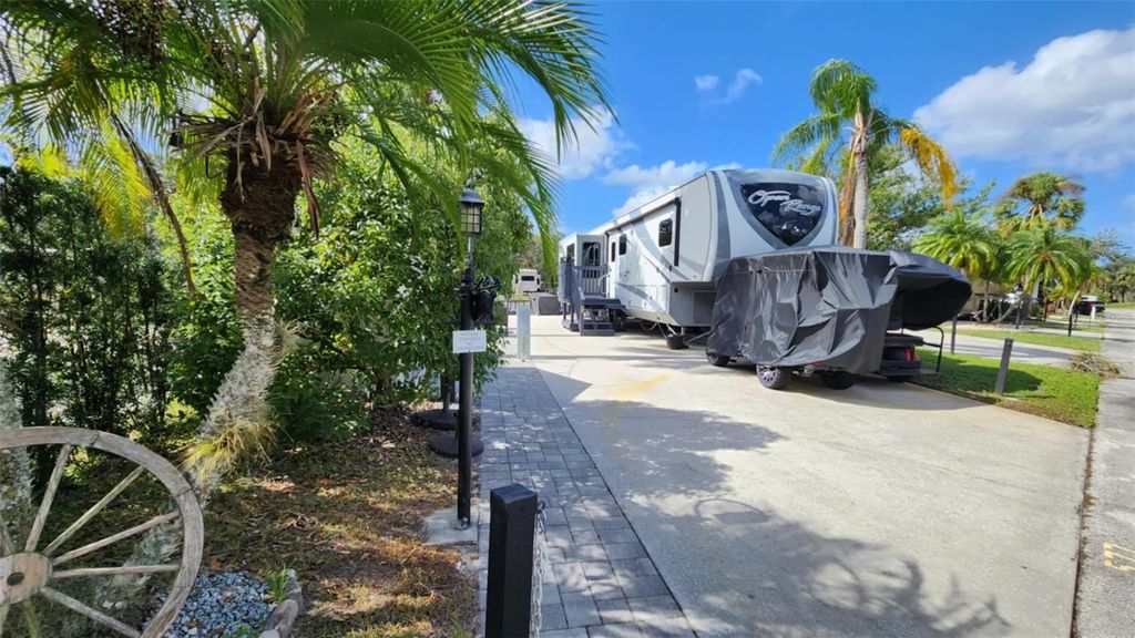 Photo of 577 Waterway Drive, River Ranch, FL 33867 (MLS # TB8316808)