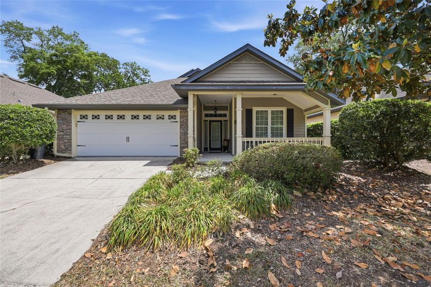 Some homes just feel right the moment you walk in. This charming Tommy Williams "Hamilton" in the heart of Longleaf checks every box and then some. Step onto the front porch, tucked behind a lush privacy hedge beside a mature Magnolia tree, and you'll already feel the difference. West-facing and sun-drenched in the afternoon, it's the kind of spot that becomes your favorite evening retreat.
Inside, the open split-bedroom floor plan is filled with natural light, soaring ceilings, crown molding, and a seamless flow from kitchen to living to dining: bright, airy, and move-in ready with professionally cleaned carpet. The kitchen features granite countertops, cherry-hued cabinetry, a tile backsplash, peninsula with breakfast bar seating, and like-new appliances.
The private primary suite is your own sanctuary, tucked away from the secondary bedrooms with direct French door access to a spacious screened porch, where morning coffee or evening unwinding happens without leaving home. The ensuite features dual vanities, soaking tub with mosaic tile surround, walk-in shower, private water closet, and a generous walk-in closet with wrap-around shelving.
A storage shed, 2-car garage with attic storage, interior laundry room, wood-fenced backyard, and a brand new 2026 roof round out a home that's truly ready for its next chapter. Flood Zone X.
Longleaf living means sidewalks shaded by mature trees, a resort-style pool just a short stroll away, tennis courts, fitness center, playground, and a neighborhood that actually feels like one.   Minutes from UF, UF Health, Shands, and top-rated schools. When you're ready to venture out, Celebration Pointe and Butler Plaza put shopping and dining right at your doorstep, Kanapaha Botanical Gardens and Paynes Prairie Preserve are just down the road, and the beloved Saturday Farmer's Market at Haile Village is a weekly ritual you'll look forward to all week.