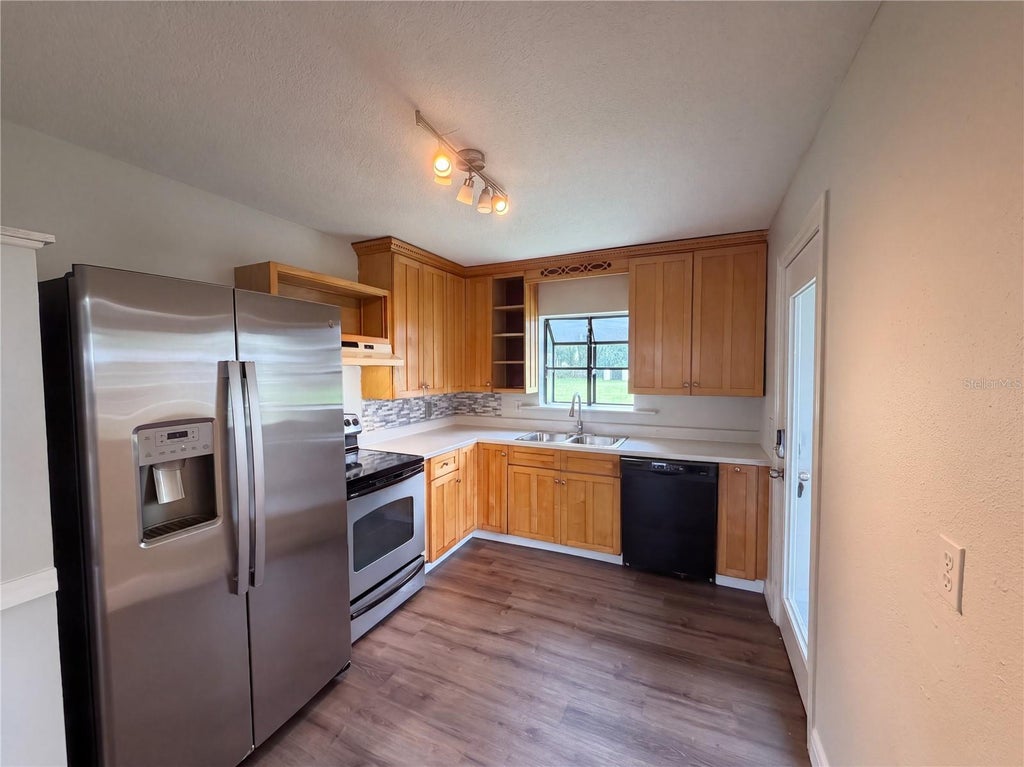 Photo of 1721 Evergreen Street, Kissimmee, FL 34746 (MLS # O6440242)