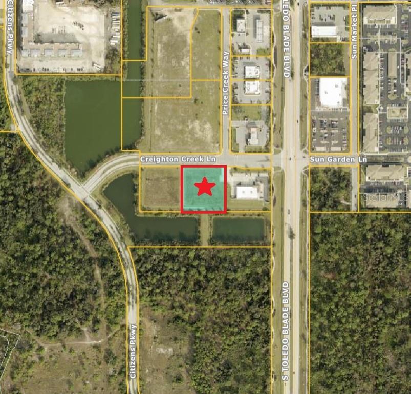 Prime Commercial Lot with City Water & Sewer – A fantastic opportunity to own a beautiful commercial lot in the rapidly growing North Port area! Located just 5 minutes from I-75, North Port offers unbeatable convenience and access. The city boasts a variety of community highlights, including a new water park, the Atlanta Braves Spring Training Stadium, vibrant shopping and dining options, and plenty of public parks. With North Port's continued growth, this is a prime location for your next business venture. Don’t miss out—drive by and make your offer today! The adjacent vacant lot is also for sale, see MLS #C7504564