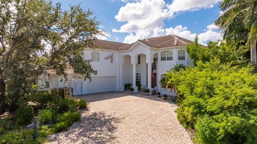 Gorgeous estate home in beautiful St. Charles Harbour, just minutes to Sanibel and Fort Myers Beach. Welcome to this extraordinary estate that embodies the finest in Southwest Florida living. Situated within the exclusive, gated St. Charles Harbour community, this custom two-story residence offers the ultimate blend of luxury, privacy, and boating. It features 5 bedrooms, 4 full bathrooms, a 3-car garage, and nearly 4,700 square feet of thoughtfully designed living space, ideal for both relaxed everyday living and elegant entertaining. Step through the grand entryway into light-filled interiors featuring a spacious executive study with a gas fireplace, a versatile bonus room, and a loft ideal for music, fitness, or a home theater. The primary suite is a true retreat, complete with dual vanities, a walk-in shower, separate tub, and an attached flex room—perfect for a nursery, office, or reading nook. Additional guest accommodations include a downstairs suite with a private bath, ideal for visiting family, in-laws, or an au pair. Seamless indoor-outdoor living defines the home’s design. The expansive lanai with heated pool and spa overlooks a tranquil preserve backdrop, creating a private oasis for entertaining or unwinding. St. Charles Harbour Yacht Club is renowned for its full-service deep-water marina, offering immediate Gulf access, as well as exceptional amenities including a clubhouse with dining, tennis, and nearby golf. Surrounded by natural preserves and waterways, this community offers a serene setting just minutes from the best of Southwest Florida. Experience the luxury, lifestyle, and boating paradise that await in St. Charles Harbour.