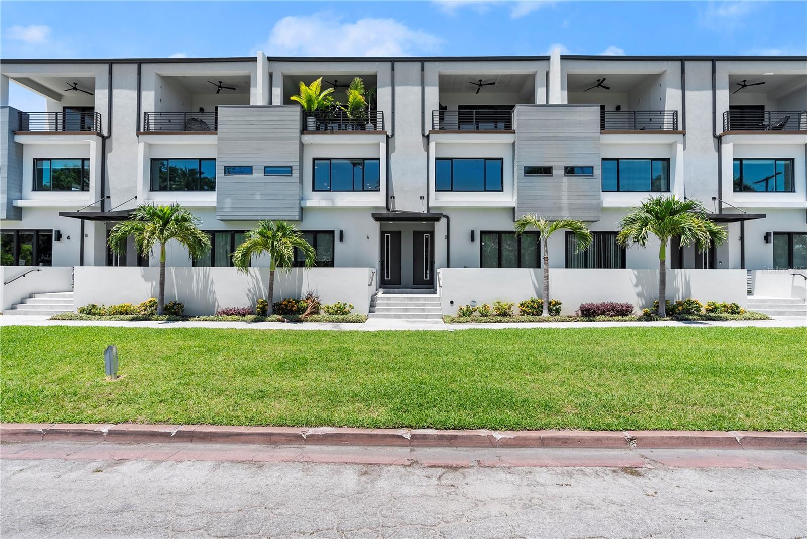 Discover refined urban living in this beautifully designed 3-bedroom, 3-bathroom townhome, ideally situated in Tampa’s thriving Westshore District. Built in 2022 by Milana Custom Homes, Unit 6 offers a perfect blend of sleek modern finishes, thoughtful layout, and unbeatable value—with lower HOA fees than many of Tampa’s new builds. This interior unit boasts a warm, welcoming feel while still delivering the elevated features today’s buyer craves. Step inside and enjoy soaring ceilings, wide-plank engineered hardwood floors, and a light-filled open-concept floorplan. The Master Suite features its own wellness forward design. The chef’s kitchen is outfitted with quartz countertops, GE Profile appliances, gas range, custom cabinetry, and stylish lighting—making everyday cooking and entertaining effortless. Each bedroom is generously sized, with three full bathrooms offering spa-inspired finishes and designer tile work. The primary suite is a retreat of its own, complete with a walk-in closet, soaking tub, and oversized glass shower. Enjoy multiple outdoor spaces, including a covered balcony ideal for morning coffee or evening unwinding. A 2-car garage, impact-rated windows and doors, and tankless gas water heater complete the package. Best of all, you’re just minutes from I-275, Tampa International Airport, Midtown, Downtown, and a short walk to the soon-to-be-reimagined Westshore Mall Redevelopment—destined to become one of the city’s top destinations for retail, dining, and entertainment. Whether you're seeking a stylish personal residence or a smart investment in a rapidly growing pocket of Tampa, Unit 6 offers exceptional lifestyle and value in one of the city’s most connected neighborhoods.