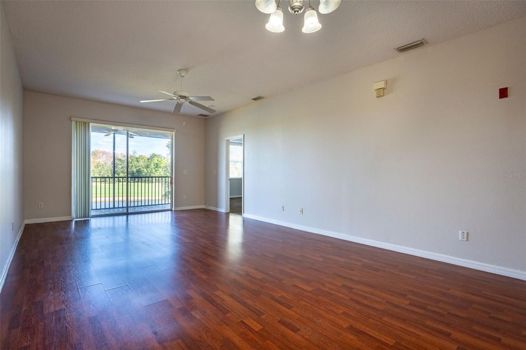 Photo of 9435 Myrtle Creek Lane #311, Orlando, FL 32832 (MLS # O6396044)