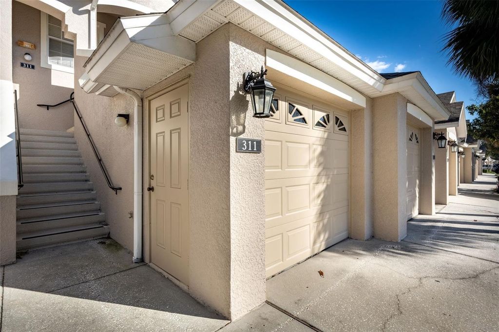 Photo of 9435 Myrtle Creek Lane #311, Orlando, FL 32832 (MLS # O6396044)