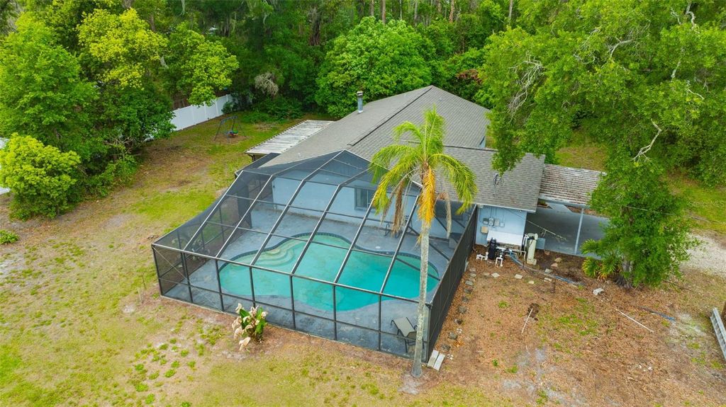 Photo of 407 1st Avenue NE, Lutz, FL 33549 (MLS # TB8493832)