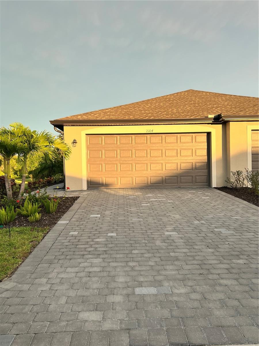 Welcome to your dream home in one of Port Charlotte's premier gated communities! This exquisite 2-bedroom, 2-bathroom villa spans 1,569 sq ft under air and offers a flexible floor plan to suit your lifestyle. Home Features: Spacious Living: Enjoy an open and airy layout with premium tile flooring throughout and upgraded ceiling fans in every room, ensuring comfort and style. Modern Kitchen: The heart of this home is its stylishly upgraded kitchen, featuring granite countertops, modern cabinetry, and modern appliances, perfect for culinary enthusiasts. Primary Suite: Retreat to the tranquil primary suite, complete with a luxurious en-suite bathroom and direct access to a screened lanai. Savor your morning coffee or unwind in the evening with breathtaking lake views and serene surroundings. Flex Room: Adaptable to your needs, the additional flex room can serve as a home office, guest room, or hobby space. Ample Storage: A spacious 2-car garage provides ample storage for vehicles and more. Community Amenities: Clubhouse: Meet your neighbors and enjoy community events in the welcoming clubhouse. Heated Pool: Take a dip in the heated pool year-round or relax poolside with a good book. Fitness Center: Stay active and healthy with state-of-the-art equipment and facilities. Pickleball Courts: Engage in friendly competition and fun on the community's pickleball courts. Location: Prime Location: Located just minutes from Sunseekers Resort and Charlotte Sports Park, you'll have easy access to entertainment, dining, and outdoor activities. Scenic Views: Nestled in a peaceful community, this home offers scenic views and abundant wildlife, providing a tranquil retreat from the hustle and bustle. Don't miss the opportunity to make this stunning villa your new home. Experience the perfect blend of luxury, comfort, and convenience in Port Charlotte. Contact us today to schedule a private tour!