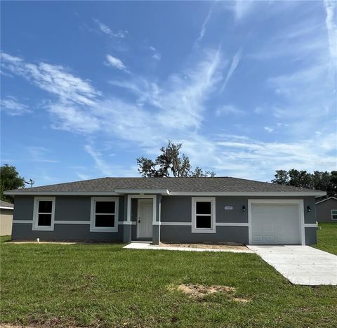 Photo of 20855 SW Beach Boulevard, Dunnellon, FL 34431 (MLS # OM715235)